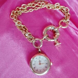 Vintage Kirks Folly Gold-Tone Chain Watch Bracelet with Star Charm.